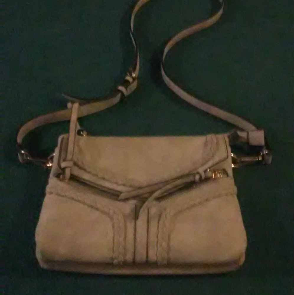 Beige designer strap bag pocketbook